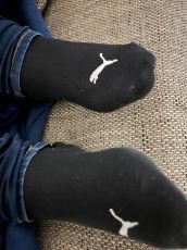Getragene Socken und Fußbilde